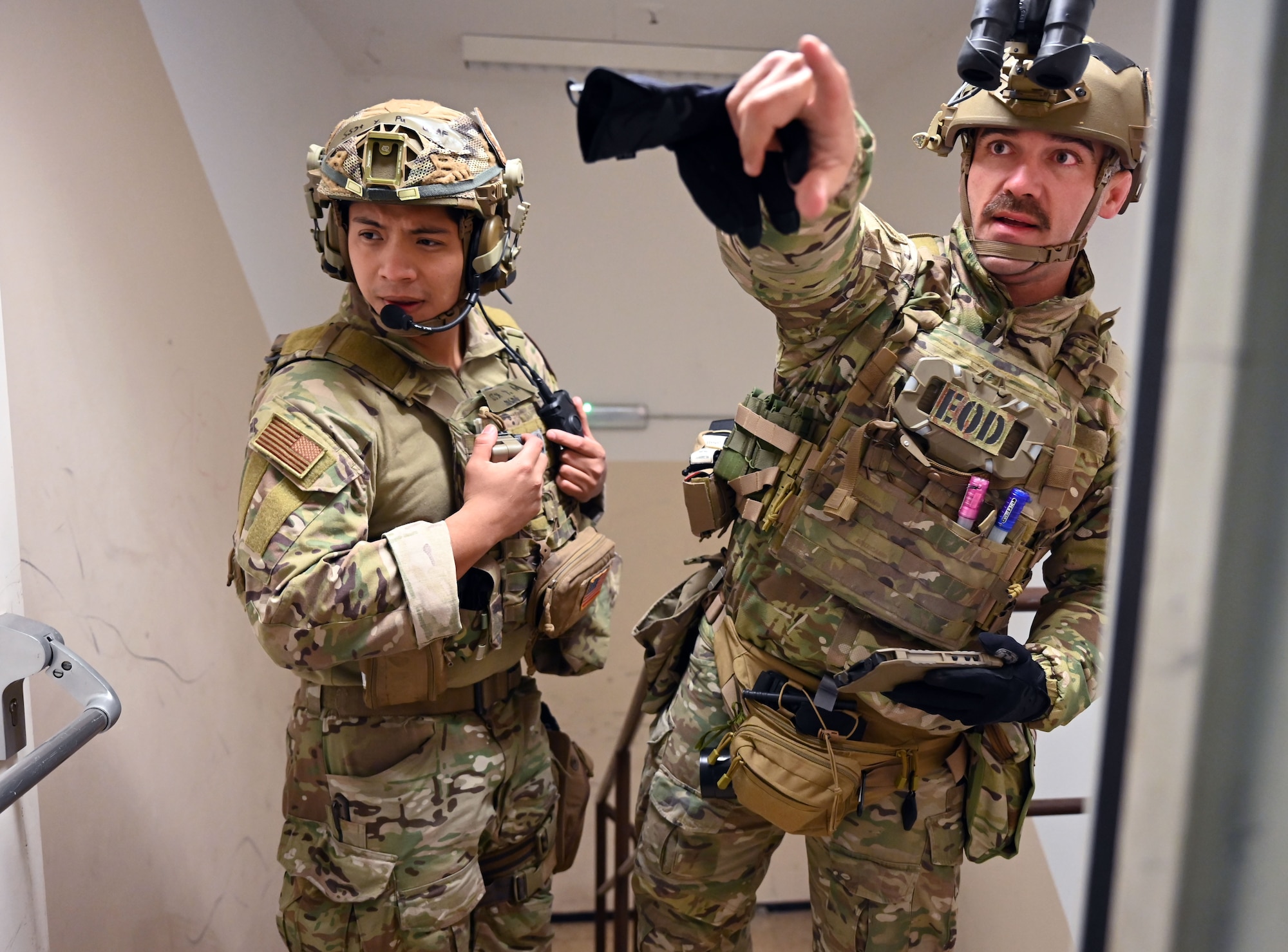 U.S. Air Force Staff Sgts. Yin Pu and Bryan Barnard, both Silver Flag participants, conduct an Explosive Ordnance Disposal exercise March 10, 2026, at Ramstein Air Base, Germany. Silver Flag covered a wide range of critical skills, including airfield damage repair, response to chemical, biological, radiological, and nuclear threats, lodging operations, and mortuary affairs. This iteration was also the first time the force support career field rejoined their civil engineer and logistics readiness counterparts in three years. (U.S. Air Force photo by Capt. Amber R. Kelly-Herard)