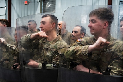 Soldiers assigned to the 246th Transportation Battalion, 272nd Regional Support Group, Michigan Army National Guard, conduct a National Guard Response Force validation exercise, March 12, 2026, at Camp Grayling Joint Maneuver Training Center, Mich.