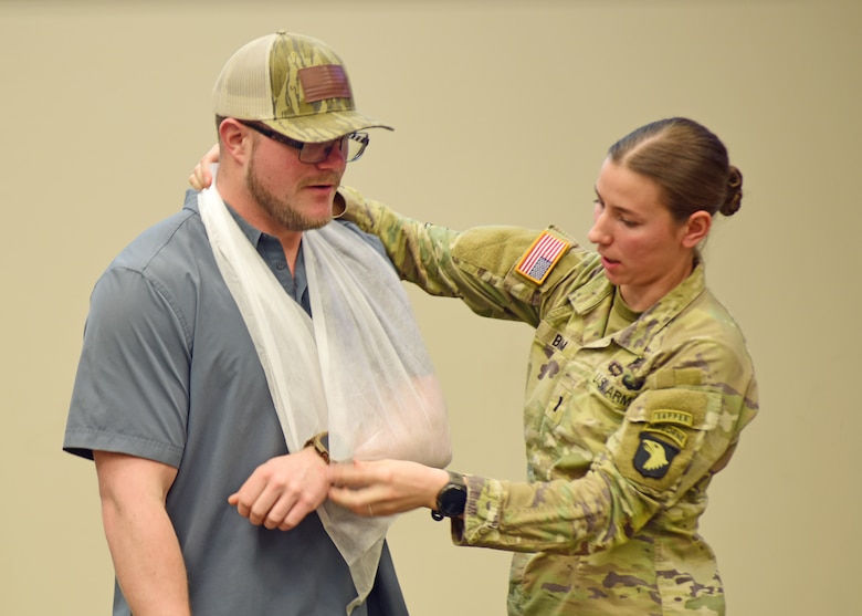 Safety Specialist Daniel Rennaker and 1st Lt. Annalise Bloom demonstrate how to immobilize an arm using a sling during a session on first aid March 11, 2026, during the U.S. Army Corps of Engineers Nashville District’s annual Park Ranger Workshop at Chattanooga State Community College in Chattanooga, Tennessee. (USACE Photo by Lee Roberts)