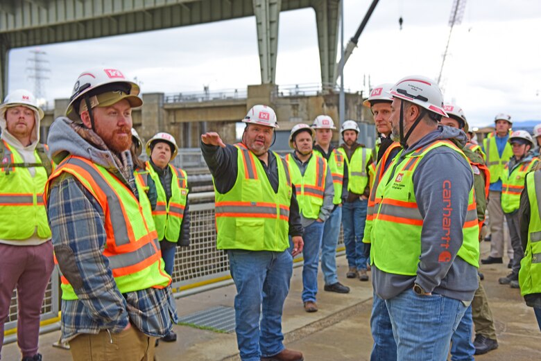 Chickamauga Lockmaster Paul Weaver (Center) leads Nashville District’s park rangers on a tour of the active navigation lock March 12, 2026, on the Tennessee River in Chattanooga, Tennessee, during the annual Park Ranger Workshop. The park rangers benefitted from visiting the navigation lock that is being replaced by a larger more efficient lock under construction.  (USACE Photo by Lee Roberts)