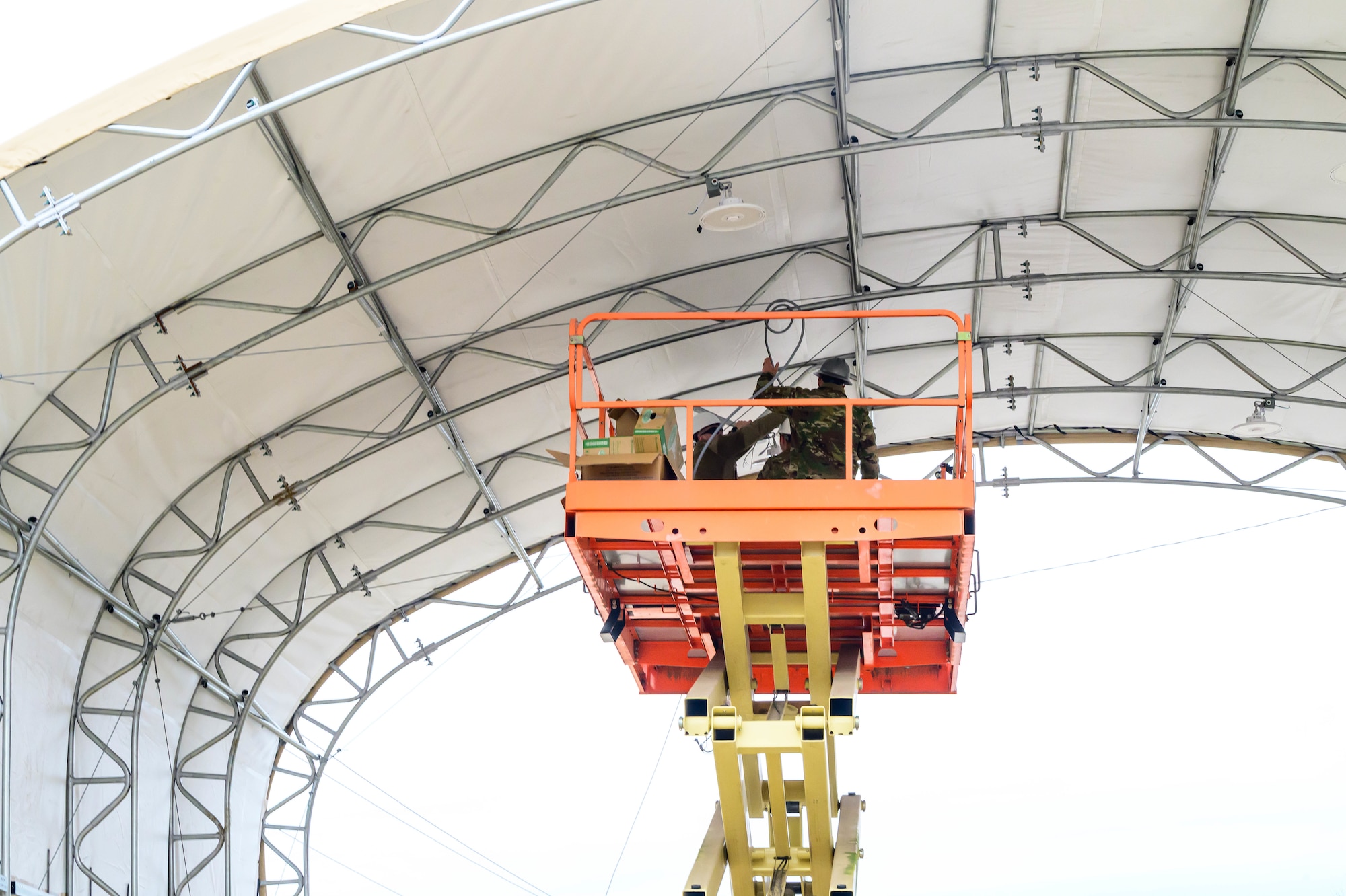 Airmen install lights