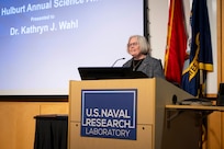 Kathryn Wahl, Ph.D., U.S. Naval Research Laboratory (NRL) Surface Chemistry branch head, gives remarks after receiving the 2025 E.O. Hulbert Annual Science Award in Washington, D.C., March 6, 2026. Wahl received the award for her significant advances in measurement, observation, and understanding of interfacial contacts. (U.S. Navy photo by Sarah Peterson)