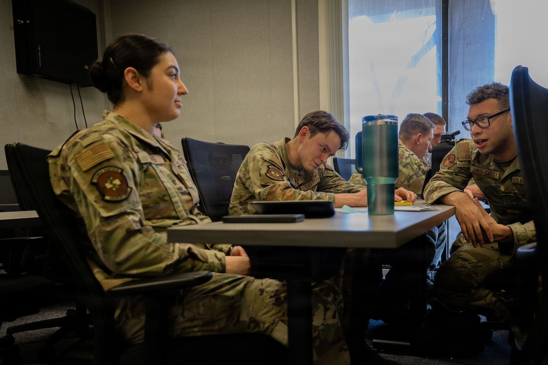 Airmen studying in class.