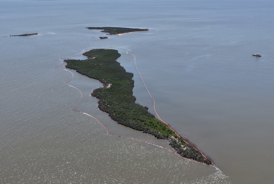 Protective and collection boom is deployed in areas impacted by Gulf oil spill.