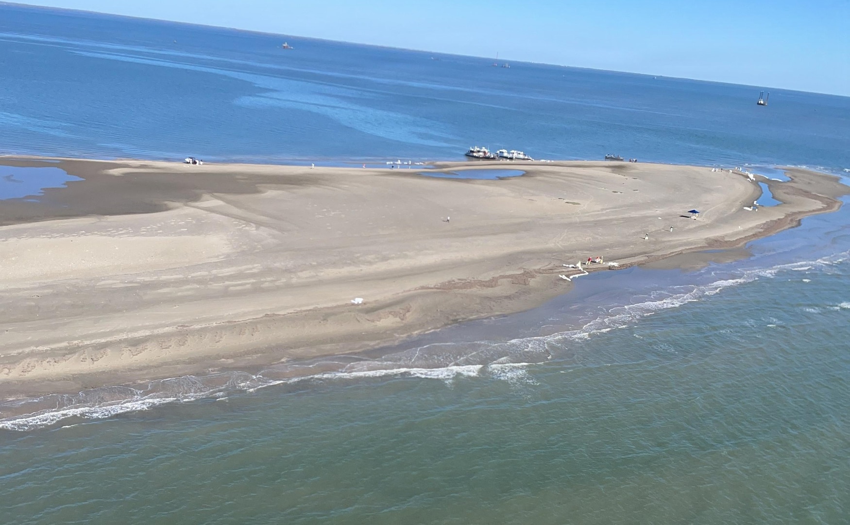 Protective and collective boom are deployed in areas impacted by Gulf oil spill.