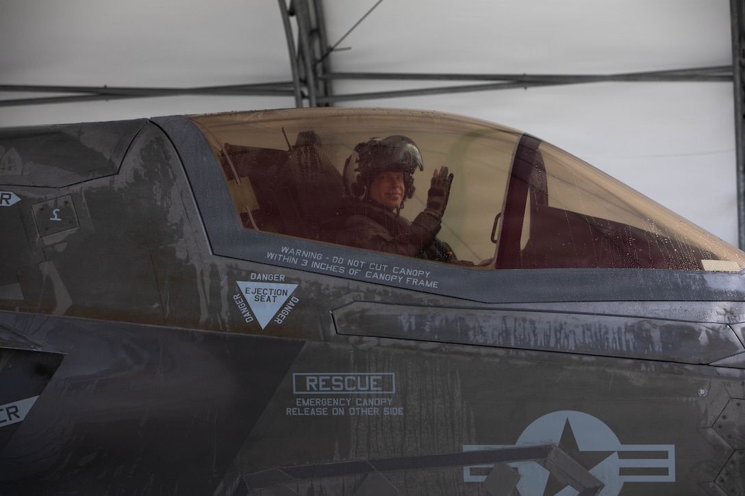 U.S. Marine Corps Maj. Gen. Marcus Annibale, the commanding general of 1st Marine Aircraft Wing, and a native of Virginia, waves for a photo after completing his final flight at Marine Corps Air Station Iwakuni, Japan, Mar. 10, 2026. Commanders often take a final flight marking the end of their tour as part of a long-standing aviation tradition. (U.S. Marine Corps photo by Lance Cpl. Siwan Lewis)
