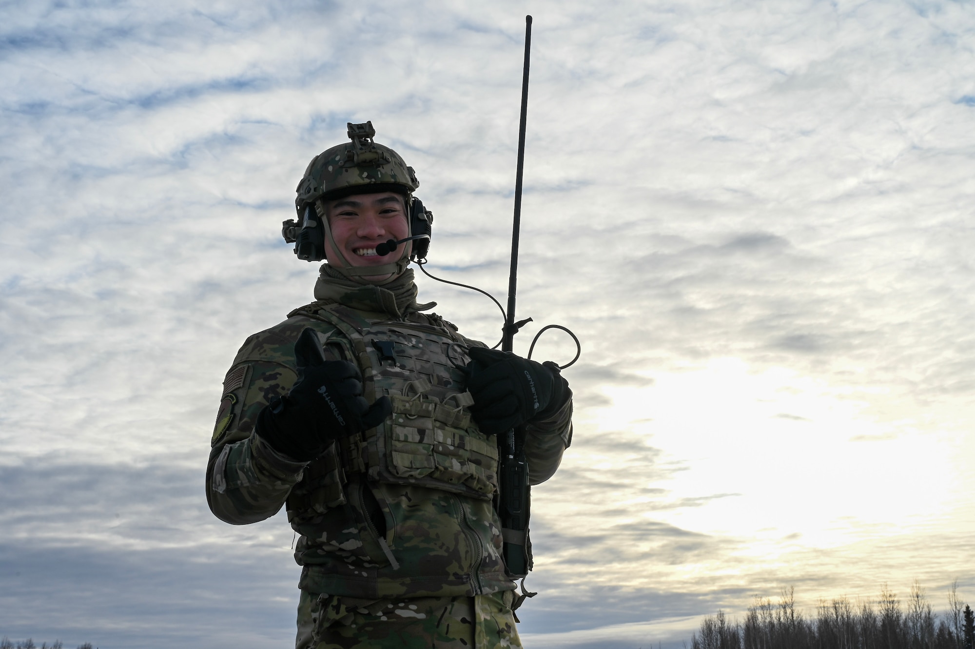 U.S. Air Force 1st Lt. Aaron Yu, 354th Operations Support Squadron airfield operations flight director of operations, poses for a photo before facilitating a landing zone operation at Eielson Air Force Base, Alaska, Feb. 17, 2026.