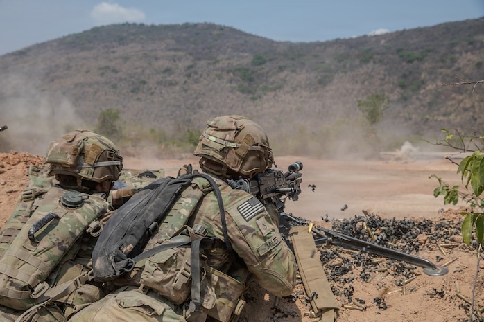 U.S. Army Soldiers assigned to 5th Battalion, 20th Infantry Regiment, 1st Battalion, 2nd Stryker Brigade Combat Team engage targets with a M249 machine gun during a live fire exercise as part of Hanuman Guardian in Lopburi, Thailand, March 12, 2026.