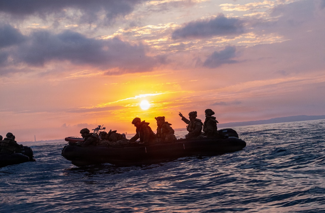 U.S. Marines with India Company, Battalion Landing Team 3rd Battalion, 1st Marine Regiment, 31st Marine Expeditionary Unit, navigate into a wedge formation for a night raid at Kin Blue Training Area, Okinawa, Japan, Feb. 15, 2025. This training aimed to enhance the ability to conduct boat raids using the newly fielded enhanced combat rubber reconnaissance craft. The 31st MEU is a persistent, combat credible force operating aboard the ships of the Tripoli Amphibious Ready Group in the U.S. 7th Fleet area of operations, routinely interacting and operating with our allies and partners to contribute to deterrence, security, crisis response, and combat operations in the Indo-Pacific region. (U.S. Marine Corps photo by Cpl. Rebeka Falcon)