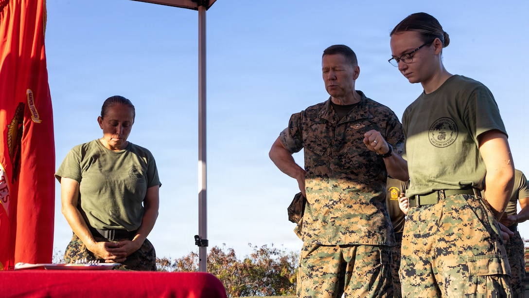 U.S. Navy Capt. Wayne Hall, center, force chaplain, U.S. Marine Corps Forces, Pacific, delivers the invocation during a Marine Corps cake cutting ceremony on Camp H.M. Smith, Hawaii, Nov. 7, 2025.  Founded on November 10, 1775, the United States Marine Corps has served our nation honorably in every clime and place for 250 years. Throughout 2025, Marines across the globe will celebrate the 250th birthday of the Corps, commemorating service, sacrifice, and priding themselves on living 'Semper Fidelis' or 'Always Faithful' to their nation and to each other. (U.S. Marine Corps photo by Lance Cpl. Moses S. Lopez Franco)