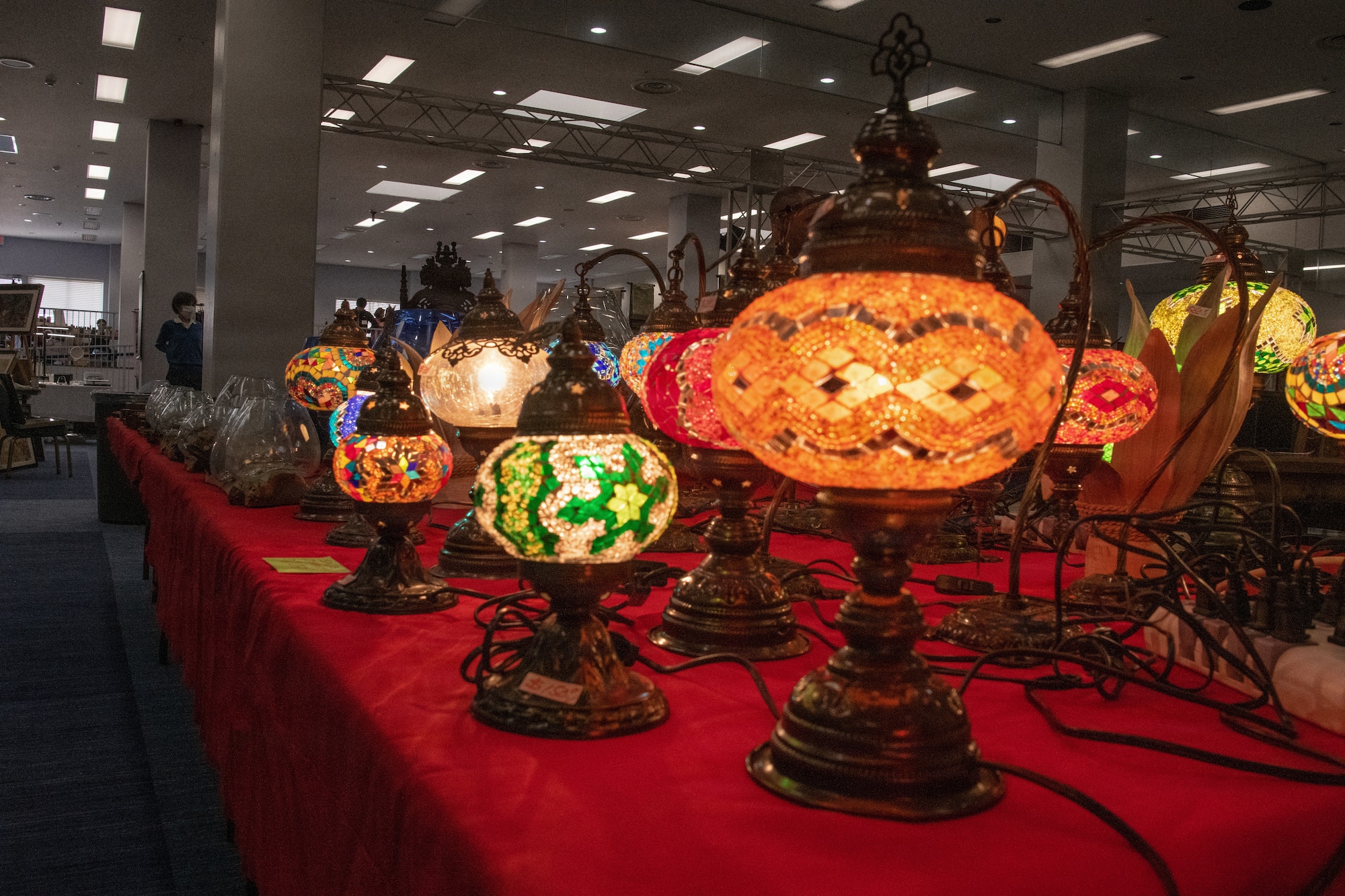 Lamps sit on a table.