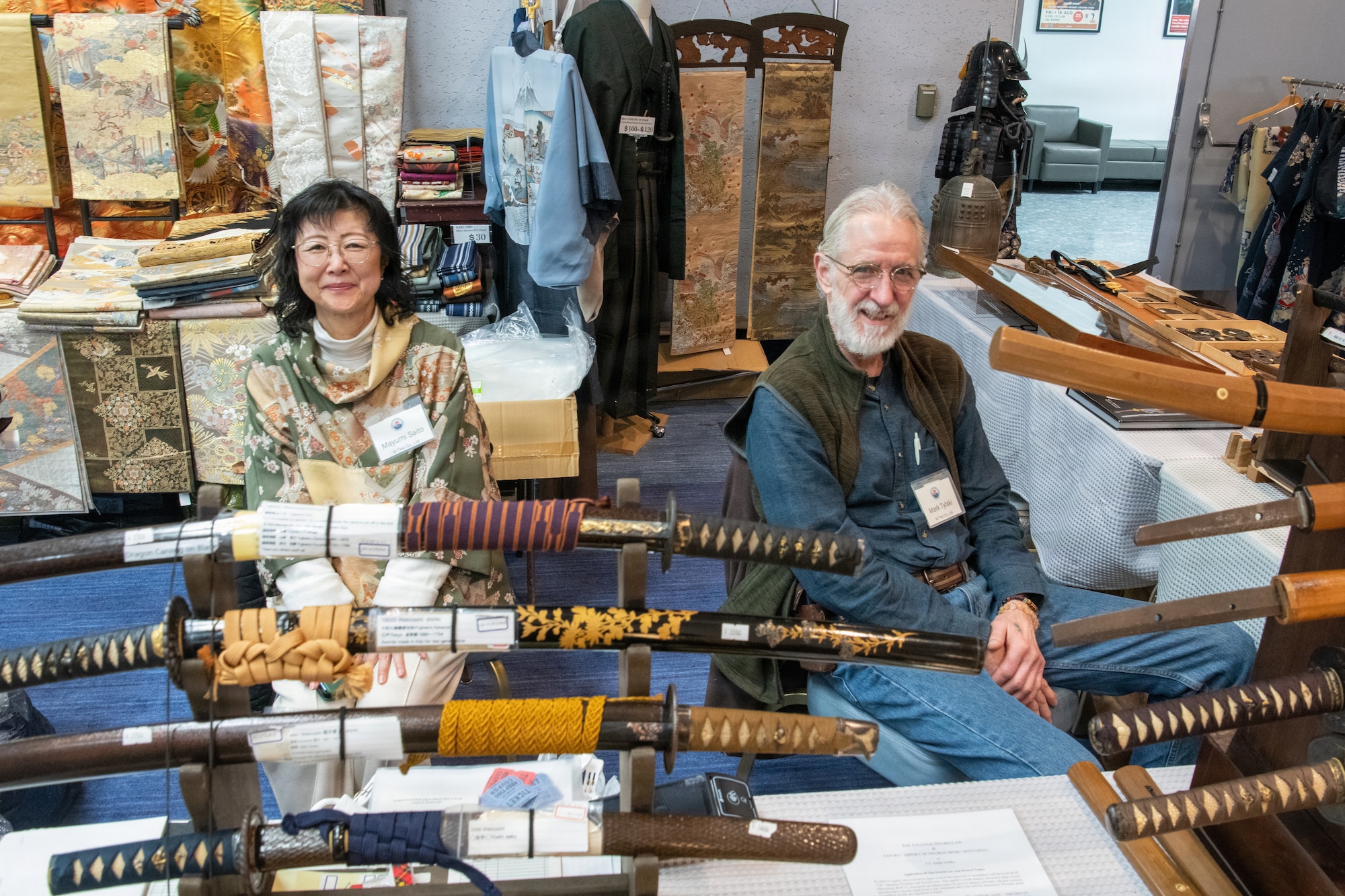 Vendors pose for a photo.