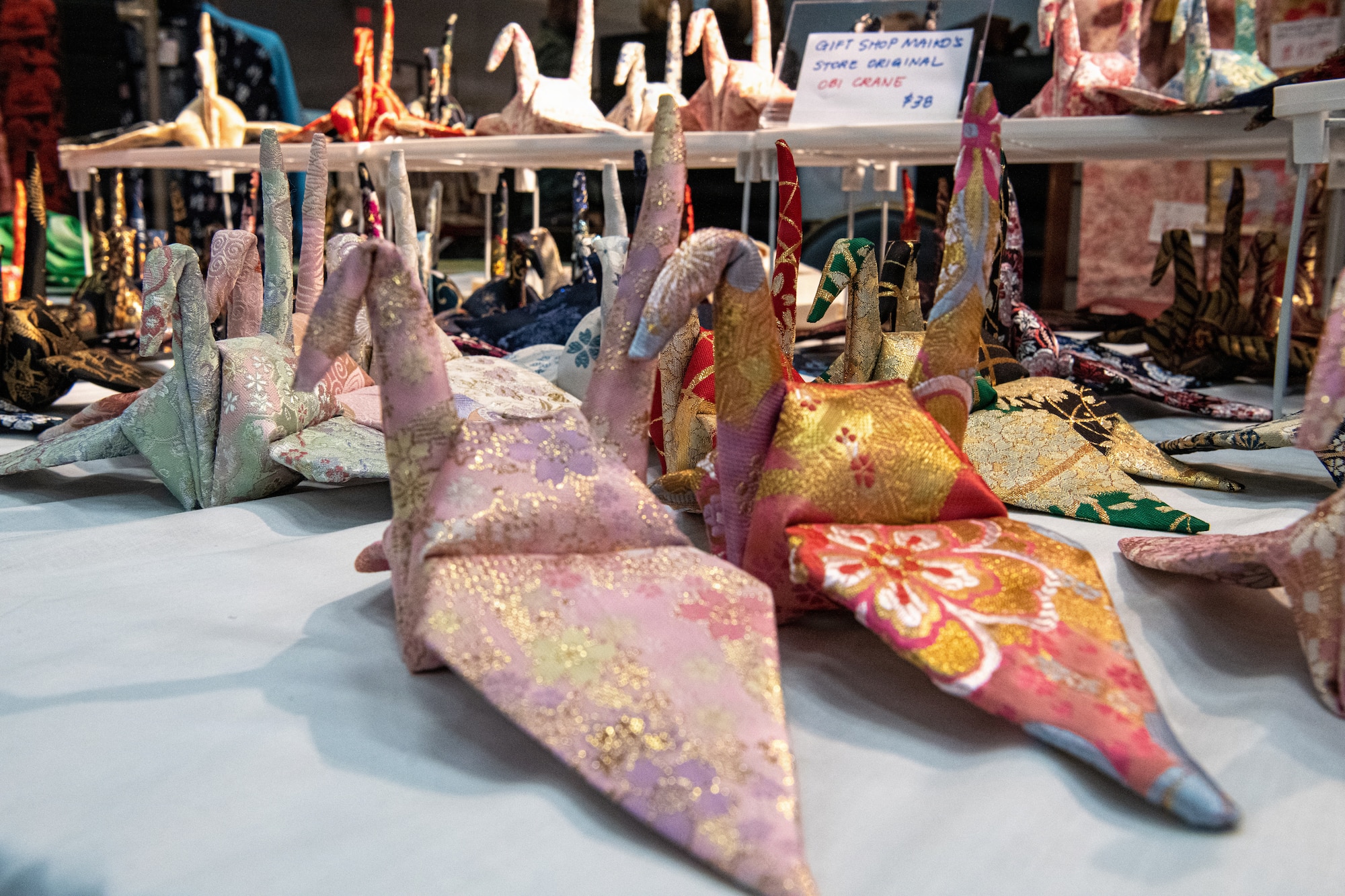 Cranes sit on table.