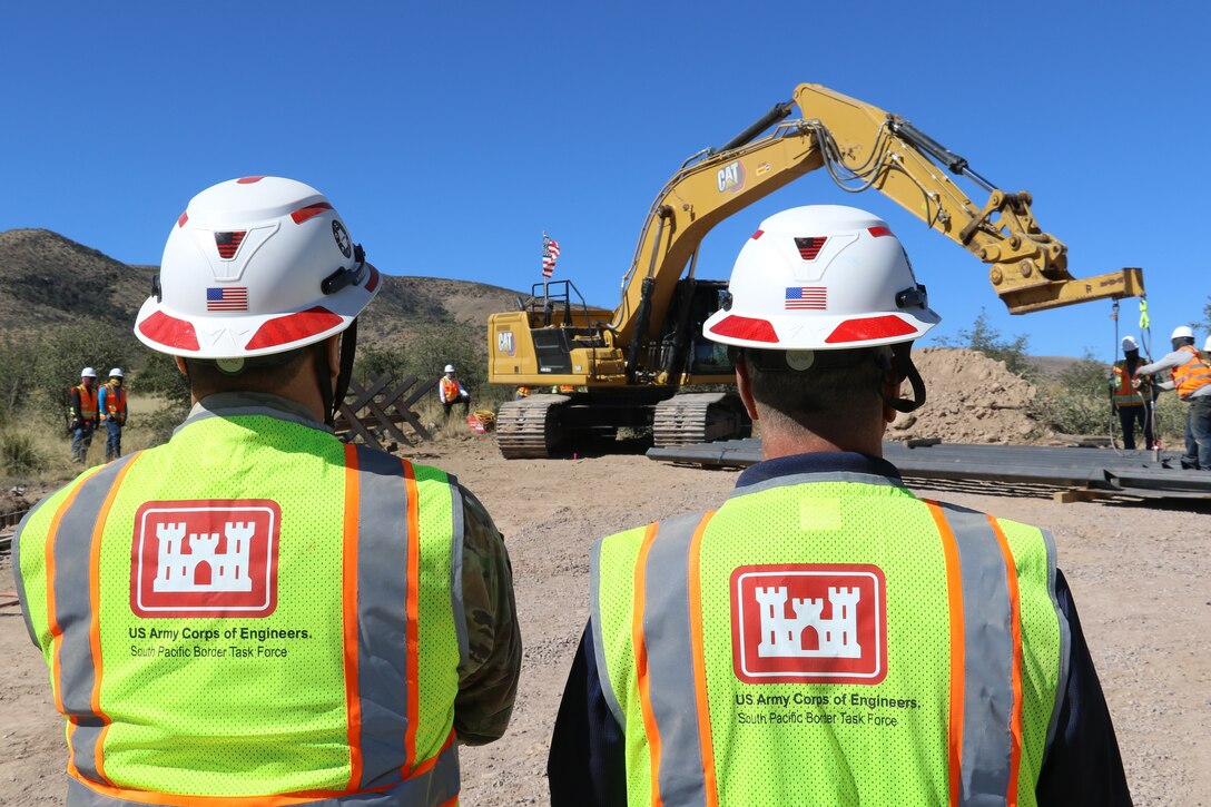Lt. Col. Jeffrey Beeman, South Pacific Border Task Force commander, and Greg Hegge, director of programs and deputy engineer, oversee the installation of the first border barrier panel at the National Defense Area One, or NDA-1, project site March 3 near Antelope Wells, New Mexico. USACE is installing border barriers along the southern border of the U.S. at the direction of the U.S. Army by the Secretary of War, in response to the presidential national emergency declaration, dated Jan. 20, 2025, authorizing the use of Section 2808 of Title 10, U.S. Code.