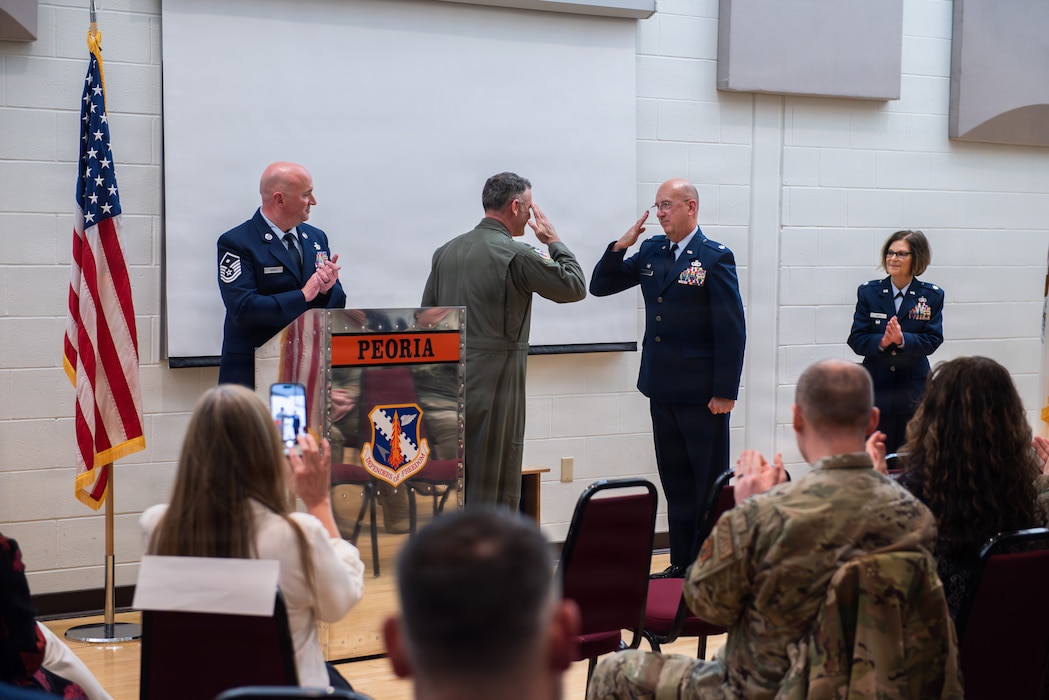 Airman being retired during ceremony.