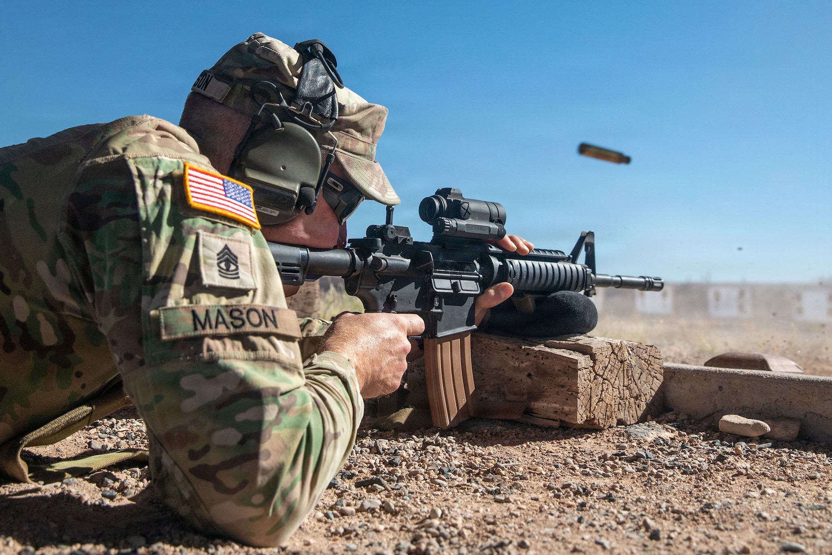 U.S. Army National Guard 1st Sgt. Benjamin Mason, assigned to the Arizona Training Center, Arizona National Guard, fires his M4 rifle during the annual Adjutant General Match at Florence Military Reservation, Ariz., March 13, 2026.