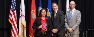 Alice Crabtree receiving Award