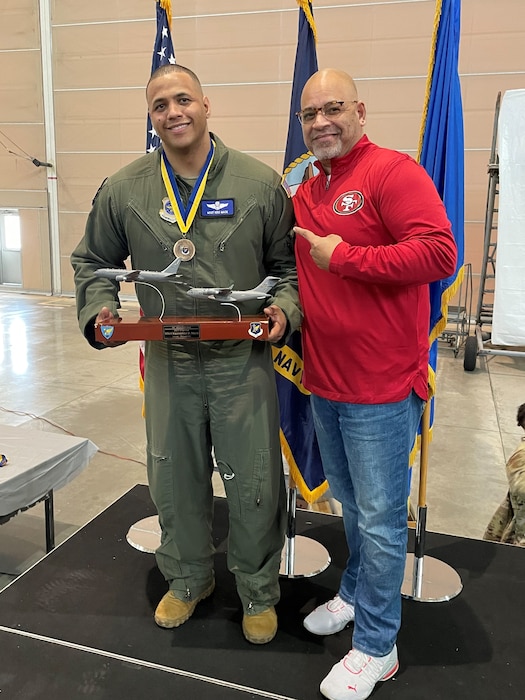 Then U.S. Air Force Master Sgt. Kristopher Mack (left), poses for a photo with his mentor, Chief Master Sgt. (retired) Geraldo “Moe” Moore, after winning the Wing’s Senior Non-Commissioned Officer of the Year award, February 2023 at Joint Base McGuire-Dix-Lakehurst, New Jersey. (Courtesy photo)
