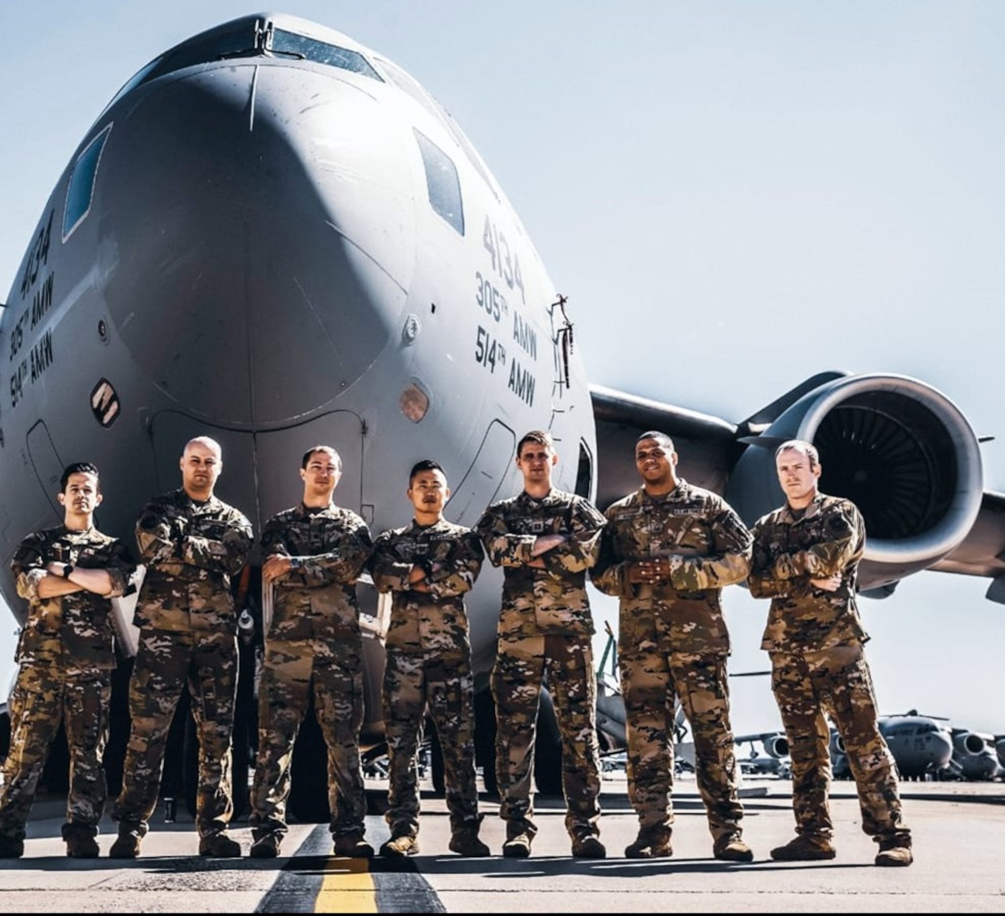 Then U.S. Air Force Master Sgt. Kristopher Mack (second from the right), poses with other C-17 Globemaster III aircraft aircrew at Joint Base McGuire-Dix-Lakehurst, New Jersey, October 2021. The photo was used for a feature about the Kabul Airlift in Flight Journal. Other members in the photo: Capt. Ian Watkins, Staff Sgt. Christopher Trudy, Maj. Thomas Sukut, Capt. David Yi, Capt. Kevin Taylor, Tech. Sgt. Colton Desmarias. (Courtesy photo)