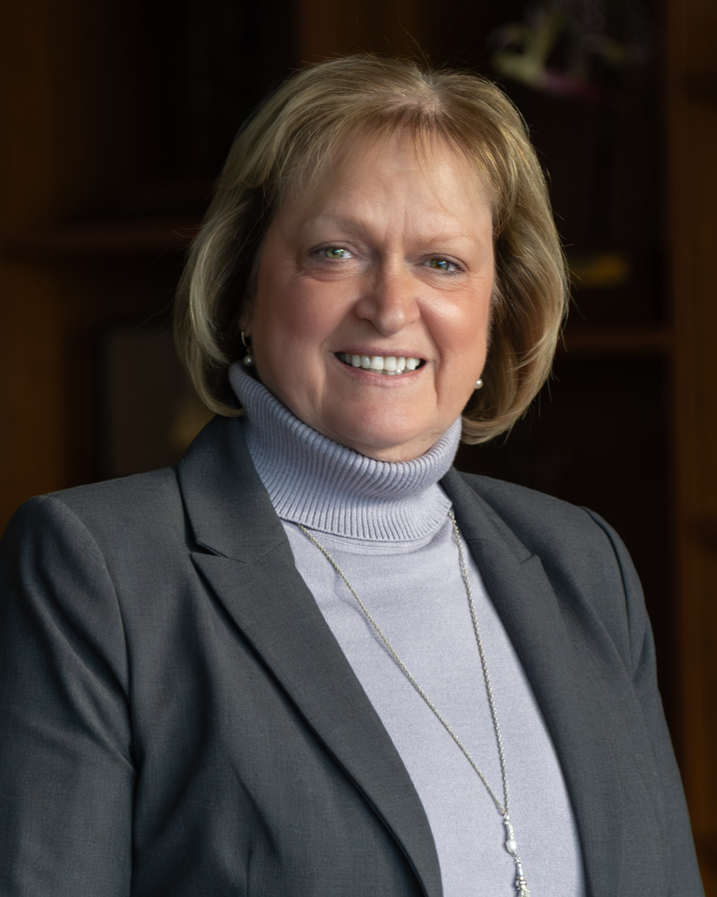 Headshot of Lisa Burt, Student Affairs Specialist, against a neutral background.