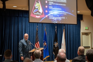 Royal Canadian Air Force Brig. Gen. Kyle C. Paul, Allied Deputy Combined Joint Force Space Component Commander, delivers remarks during the 2026 State of Vandenberg at Vandenberg Space Force Base, Calif., March 12, 2026. During the event, Paul highlighted S4S's strategic mandate to protect, defend, and deliver critical space effects, while emphasizing the importance of connecting with local and regional partners. The State of Vandenberg is an annual event that informs community members about the base mission and important updates that may have a regional impact.