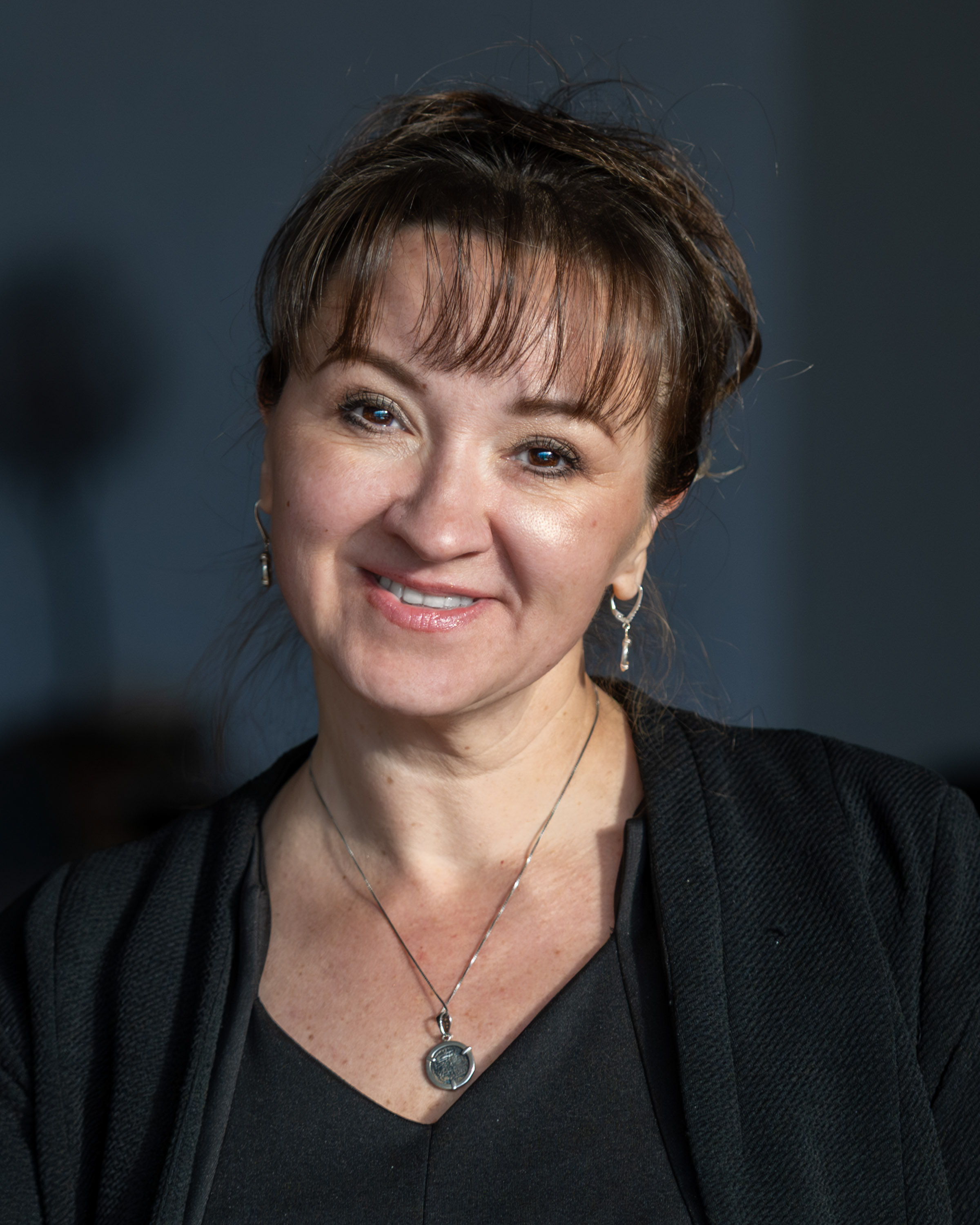 Headshot of Diana Hales, Office Manager, against a neutral background.