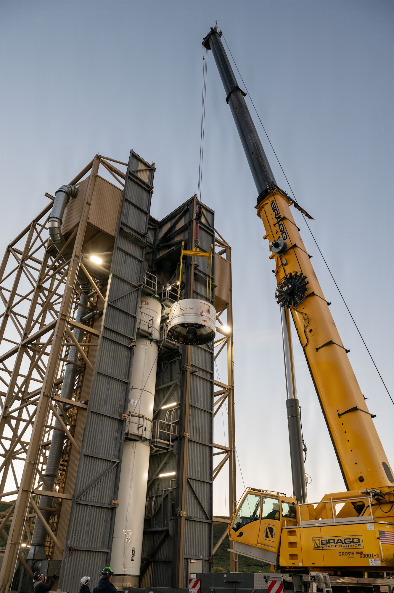 a rocket motor is lifted by a crane