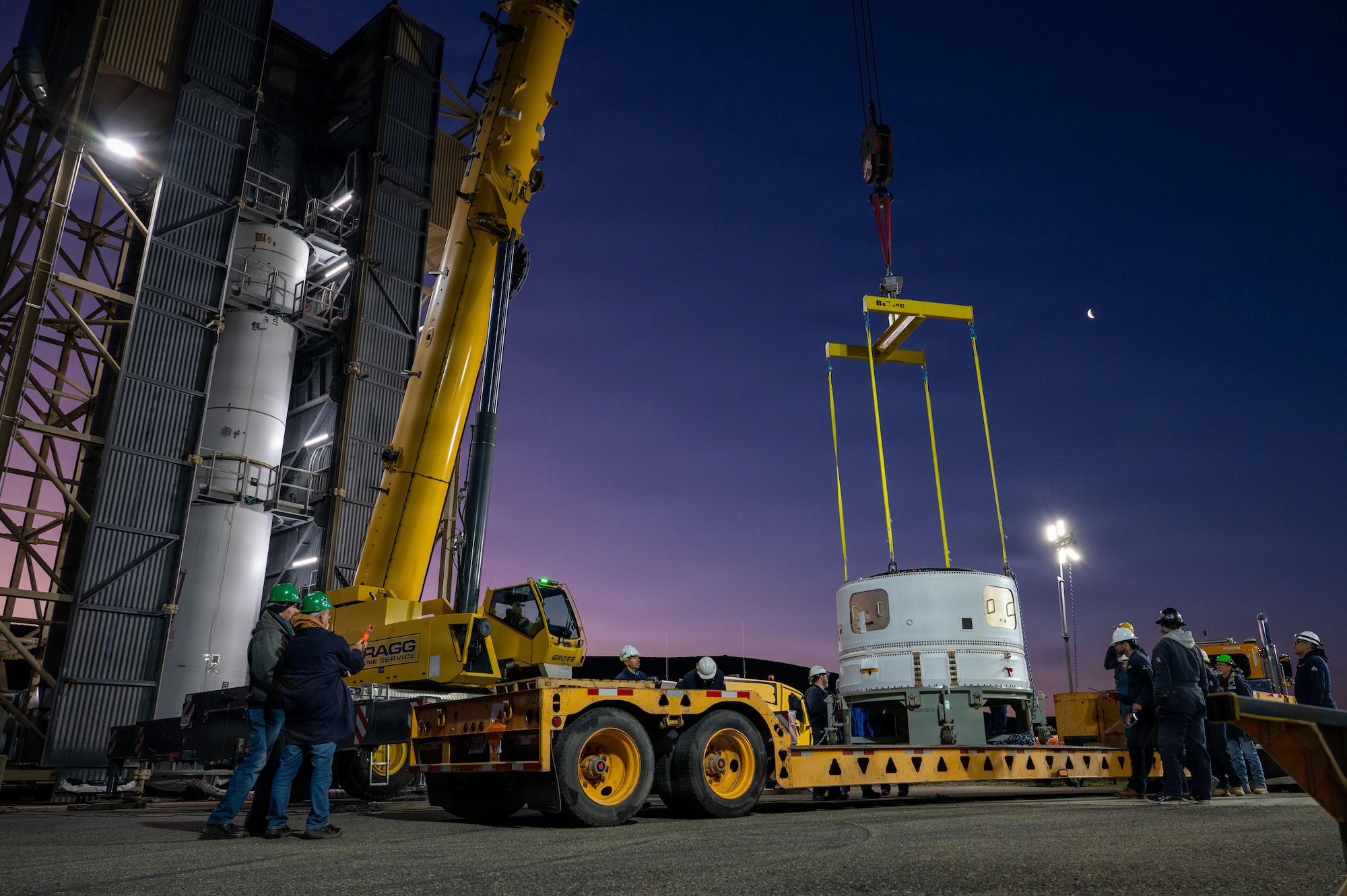 a rocket motor is lifted by a crane