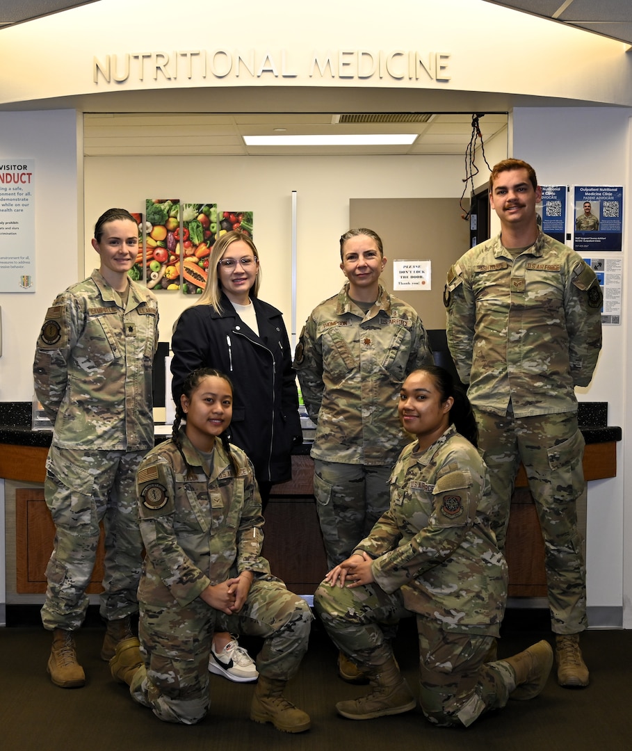 Members of the Outpatient Nutrition Clinic team pose for a group photo at David Grant Medical Center, Travis Air Force Base, Calif., Dec 10, 2025. The clinic provides body composition testing, group education, and individualized nutrition counseling to support military readiness and patient-centered care.