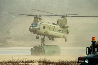 U.S. Army Soldiers assigned to 3rd Battalion, 2nd Aviation Regiment, 2nd Combat Aviation Brigade, 2d Infantry Division/ROK–U.S. Combined Division, conduct sling load operations in support of the 11th Engineer Battalion during Freedom Shield at an undisclosed location, March 14, 2026.