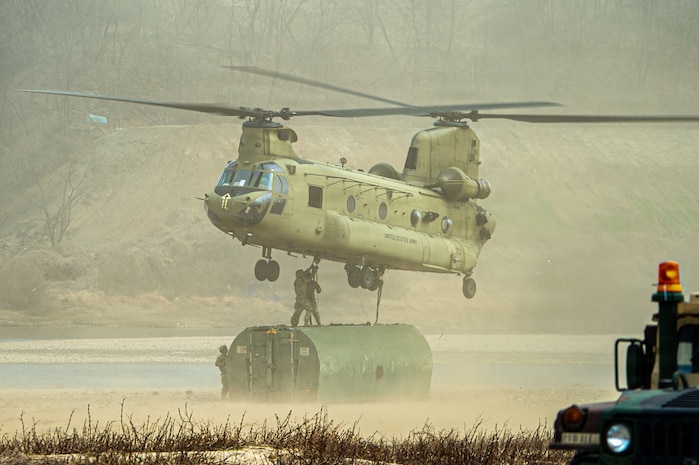 U.S. Army Soldiers assigned to 3rd Battalion, 2nd Aviation Regiment, 2nd Combat Aviation Brigade, 2d Infantry Division/ROK–U.S. Combined Division, conduct sling load operations in support of the 11th Engineer Battalion during Freedom Shield at an undisclosed location, March 14, 2026.