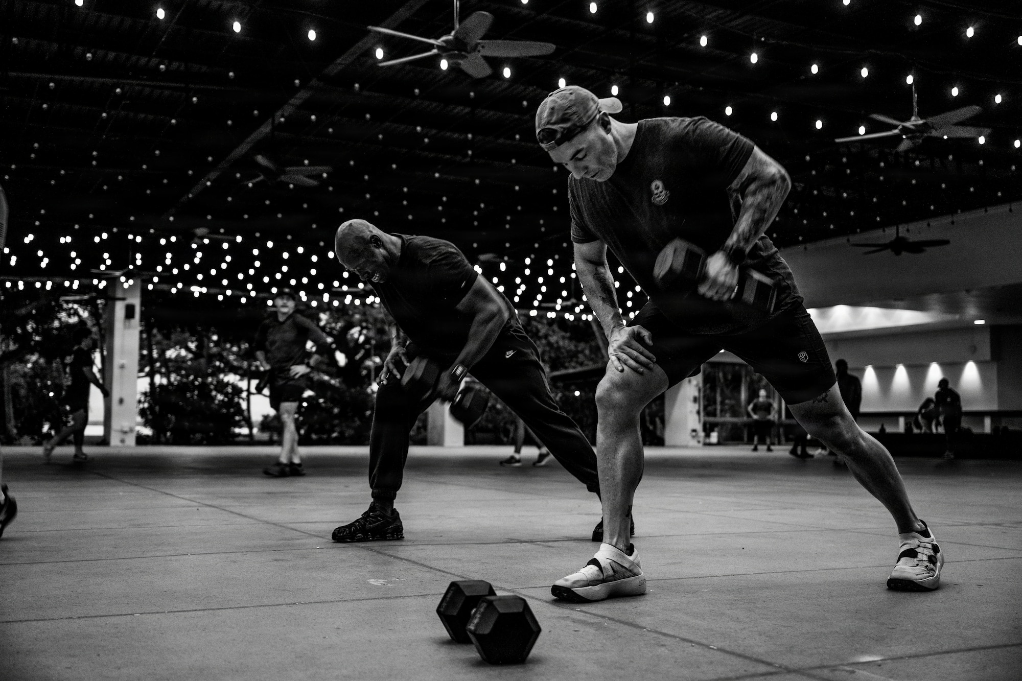 Two Airman lift dumbbell weights.