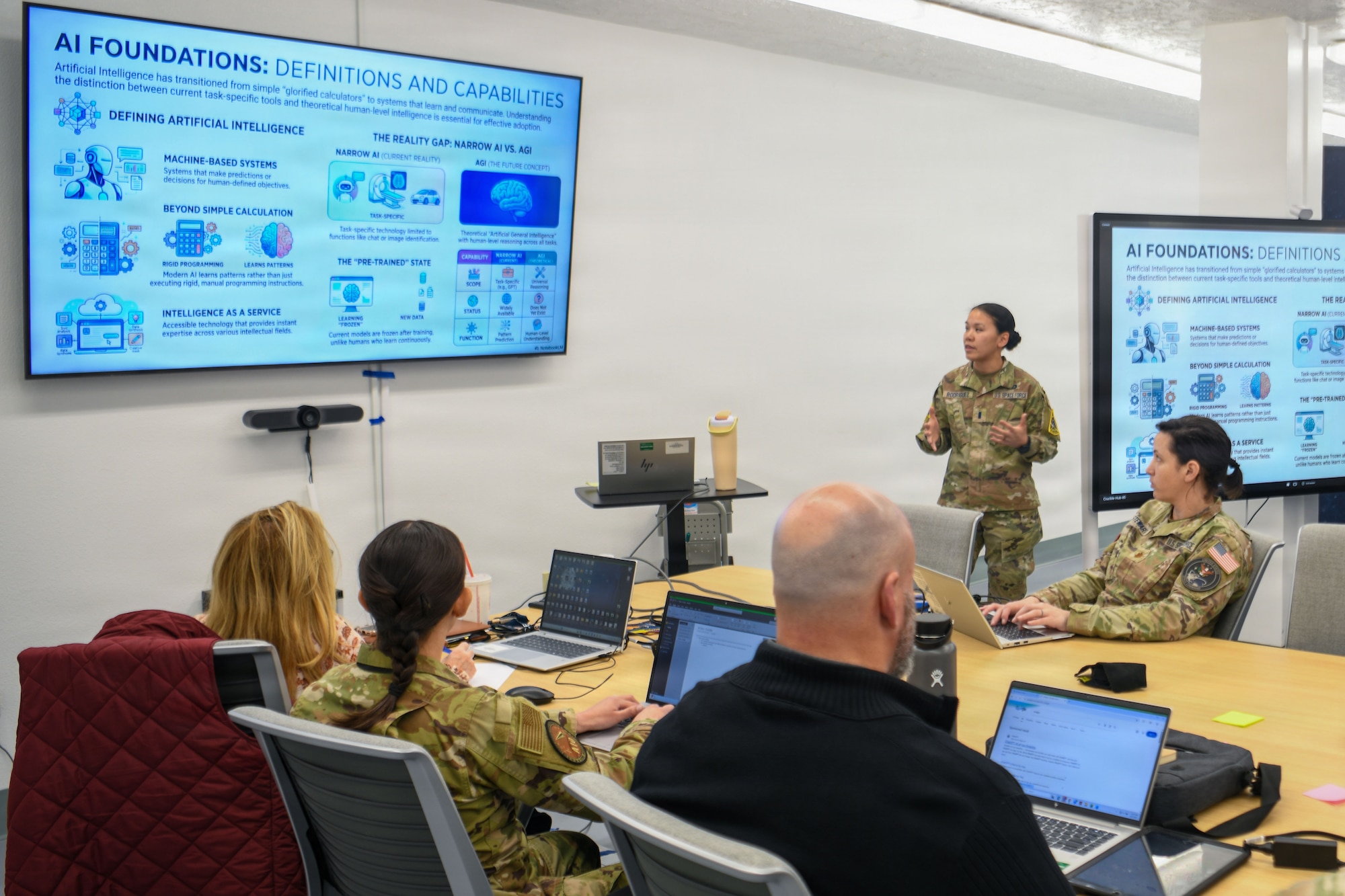 U.S. Space Force 1st Lt. Katherine Rodriguez, 30th Digital Transformation Office chief of spaceport innovation, speaks to a group of people.