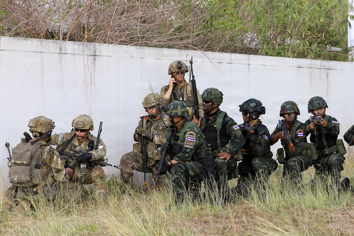 U.S. Army Soldiers assigned to 5th Battalion, 20th Infantry Regiment, 1-2 Stryker Brigade Combat Team, 7th Infantry Division, along with Royal Thai Army soldiers pull security during a force-on-force platoon attack in a Military Operations on Urbanized Terrain (MOUT) Training exercise, during Hanuman Guardian in Lopburi, Thailand, March 14, 2026.
