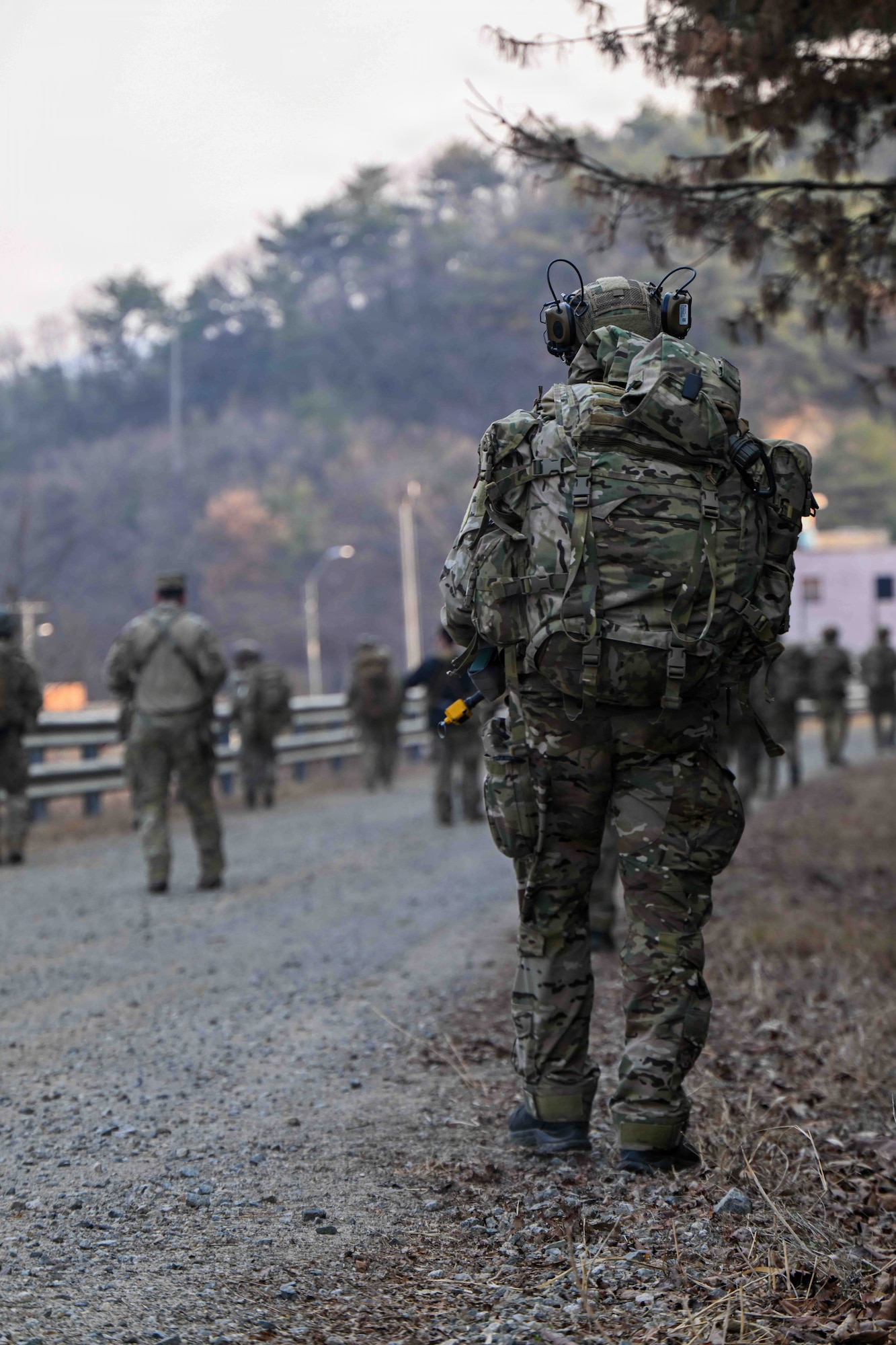 U.S. Air Force Airmen from the 607th Air Support Operations Group, march in a fire team formation during combat readiness training at Rodriguez Live Fire Complex, Republic of Korea, March 17, 2026.