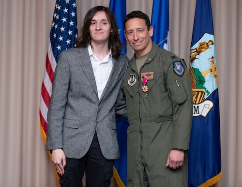Image of two people posing for a picture.