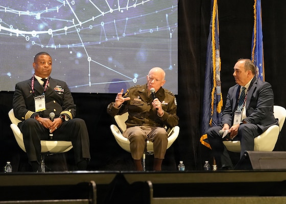 SAN ANTONIO – (March 17, 2026) – U.S. Army Maj. Gen. Darrin Cox (center), commanding general, 18th Theater Medical Command, served as a panelist on a continuing education panel titled, “Overcoming the Unique Medical Challenges across the Indo-Pacific Theater during the 2026 Annual Operational Medicine Symposium (OpMed) & Technology Showcase held at the Henry B. Gonzales Convention Center.  Other panelists included U.S. Navy Capt. Niels Olson, Medical Corps, chief medical officer, Human Systems Portfolio, Defense Innovation Unit; Capt. Delbert Clark, Medical Corps, command surgeon, 3rd Marine Division; Capt. Richard Gilliard Jr., Medical Service Corps, commanding officer, U.S. Naval Hospital Okinawa, Japan; and Dr. Darrin Frye, chief science director, Naval Medical Research Unit San Antonio. Dr. Michael McGinnis, executive director of the U.S. Navy Bureau of Medicine and Surgery, and director of the Navy Medicine Civilian Corps served as the panel’s moderator. OpMed is one of the largest and most influential military medical events in North America for senior medical officials, clinicians, government leaders, and solution providers. The symposium explores how the Military Health System is preparing for large scale combat operations by championing innovations in combat casualty care to strengthen warfighter survivability and enhance the medical readiness of the joint force. (U.S. Navy photo by Burrell Parmer, NAMRU San Antonio Public Affairs/Released)