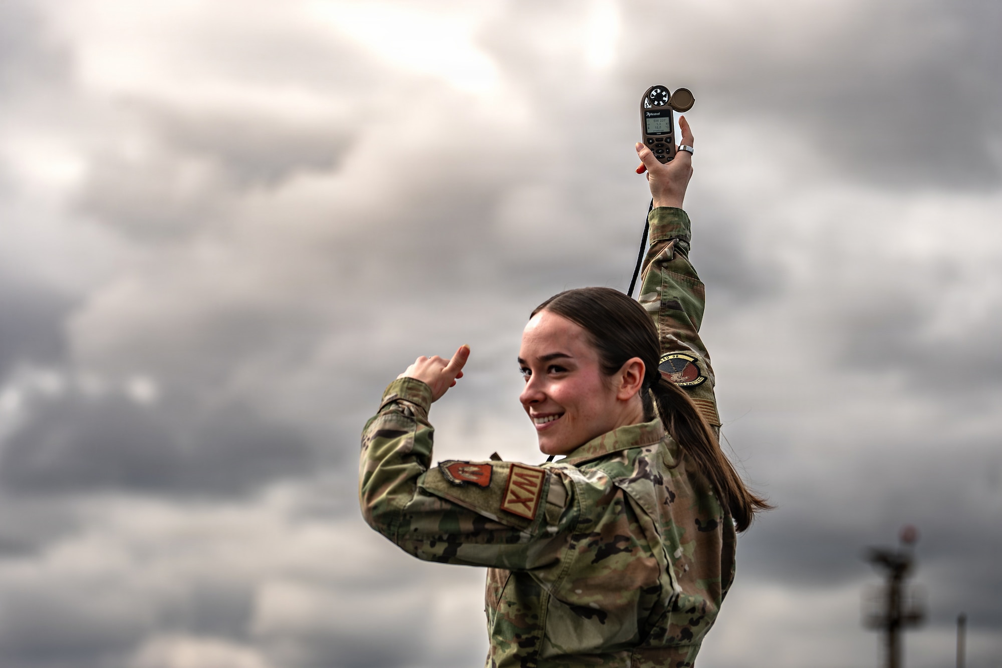 U.S. Air Force Senior Airman Mackenzie Martie, 86th Operations Support Squadron weather forecaster, uses a sensor to measure atmosphere conditions at Ramstein Air Base, Germany, March 17, 2026.