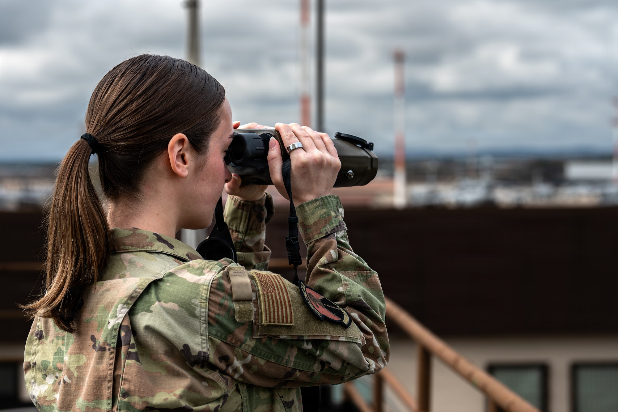 U.S. Air Force Senior Airman Mackenzie Martie, 86th Operations Support Squadron weather forecaster, uses a handheld weather sensor to measure atmospheric conditions at Ramstein Air Base, Germany, March 17, 2026.