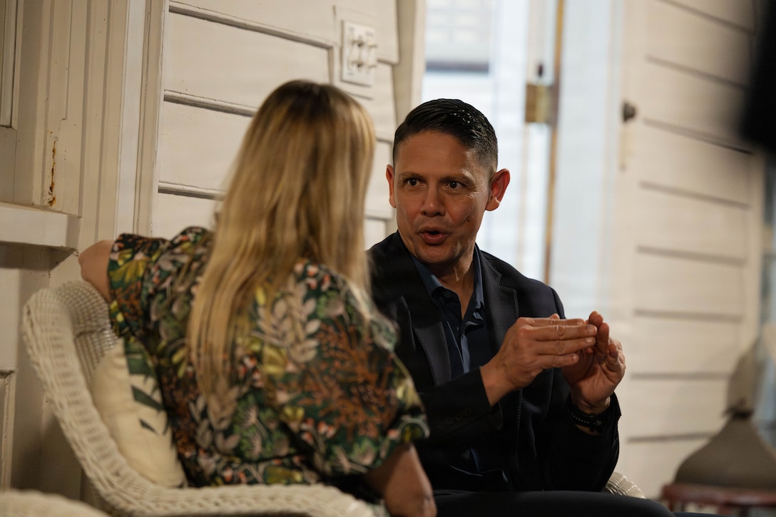 U.S. Marine Corps Sgt. Maj. Carlos A. Ruiz, the 20th Sergeant Major of the Marine Corps, right, converses with Valerie Clark, wife of Maj. Gen. Douglas K. Clark, at a social event during the Sergeant Major of the Marine Corps Force Level Summit at Quarters A, New Orleans, March 9, 2026. The summit was held for senior officers and senior enlisted advisors, serving at the Marine Forces level, to discuss important and emerging topics in the Marine Corps. (U.S. Marine Corps photo by Cpl. Van Hoang)