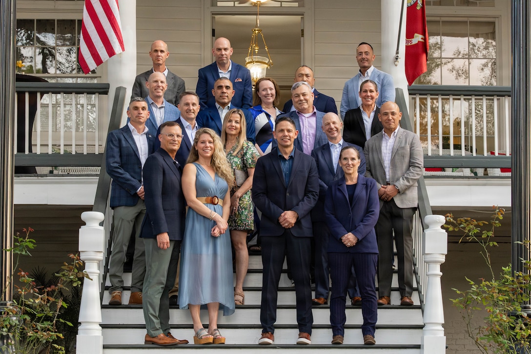 Senior officers and senior enlisted advisors pose for a group photo at a social event during the Sergeant Major of the Marine Corps Force Level Summit at Quarters A, New Orleans, March 9, 2026. The summit was held for senior officers and senior enlisted advisors, serving at the Marine Forces level, to discuss important and emerging topics in the Marine Corps. (U.S. Marine Corps photo by Cpl. Van Hoang)