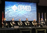 SAN ANTONIO – (March 17, 2026) – Dr. Darrin Frye (right), chief science director, Naval Medical Research Unit (NAMRU) San Antonio, served as a panelist on a continuing education panel titled, “Overcoming the Unique Medical Challenges across the Indo-Pacific Theater during the 2026 Annual Operational Medicine Symposium (OpMed) & Technology Showcase held at the Henry B. Gonzales Convention Center.  Other panelists included Capt. Niels Olson, Medical Corps, chief medical officer, Human Systems Portfolio, Defense Innovation Unit; Capt. Delbert Clark, Medical Corps, command surgeon, 3rd Marine Division; Capt. Richard Gilliard Jr., Medical Service Corps, commanding officer, U.S. Naval Hospital Okinawa, Japan; and U.S. Army Maj. Gen. Darrin Cox, commanding general, 18th Theater Medical Command. Dr. Michael McGinnis, executive director of the U.S. Navy Bureau of Medicine and Surgery, and director of the Navy Medicine Civilian Corps served as the panel’s moderator. OpMed is one of the largest and most influential military medical events in North America for senior medical officials, clinicians, government leaders, and solution providers. The symposium explores how the Military Health System is preparing for large scale combat operations by championing innovations in combat casualty care to strengthen warfighter survivability and enhance the medical readiness of the joint force. NAMRU San Antonio, part of Navy Medicine Research & Development, works alongside research partners in the civilian sphere, academia, industry, and other government agencies to drive support of Department of War objectives for a lethal fighting force and ensure U.S. service members have access to the latest scientific advances. (U.S. Navy photo by Burrell Parmer, NAMRU San Antonio Public Affairs/Released)