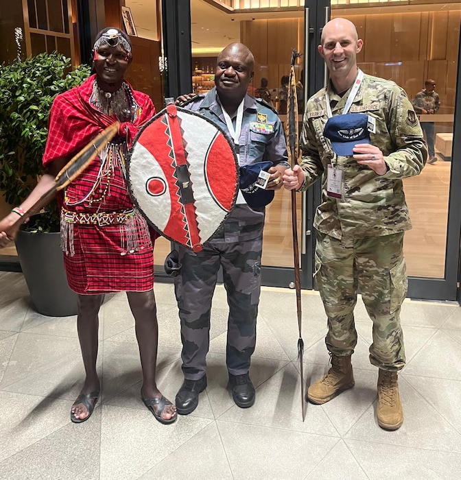 Pictured from left to right: A hotel employee dressed in traditional Kenyan clothing, a General from Gabon and LEAP Scholar Maj. Peter Barnes. The General and Barnes bought matching hats after a visit to the East African Air Museum in Nairobi to commemorate their friendship as the LEAP team was able to get to know and work with him throughout the Silent Warrior 2025 symposium. (Contributed photo).