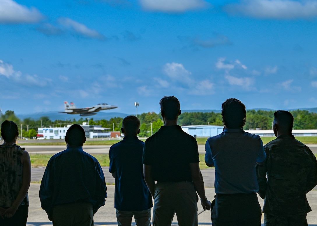 Pratt and Whitney engineers observe an F-15 takeoff during a base tour, July 15, 2025, at Barnes Air National Guard Base, Westfield, Mass. The Pratt and Whitney engineers learned how the engineers on base play to a significant role to supporting the wing's mission. 



(U.S. Air National Guard Photo by Jay Hewitt)