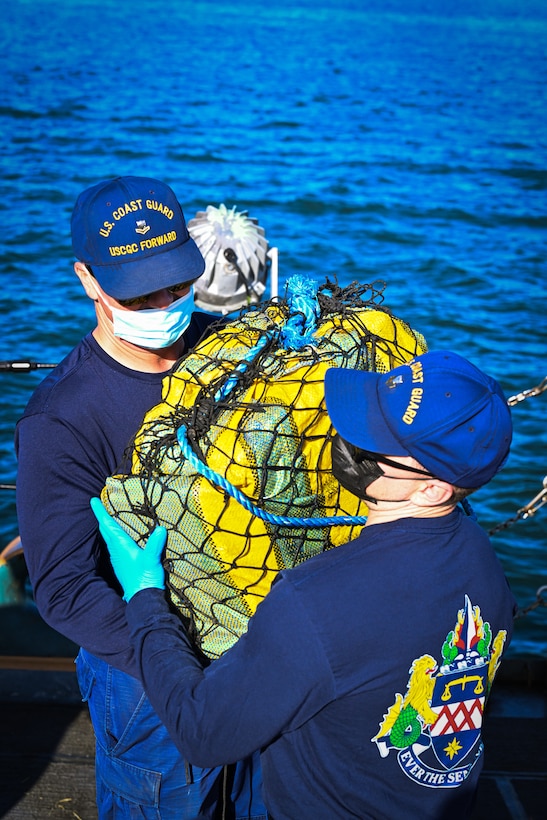 USCGC Foward’s (WMEC-911) crew offload illicit drugs valued at more than $49.3 million at Port Everglades, Florida March 19, 2026. This offload was a result of two interdictions in the international waters of the Eastern Pacific Ocean by the crews of USCGC Spencer (WMEC-905) and Forward interdicting approximately 6,750 pounds of cocaine. (U.S. Coast Guard photo by Seaman Christopher Moret)