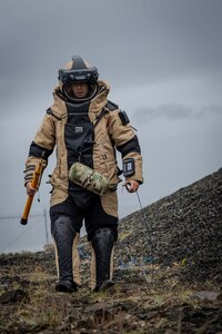 U.S. Navy explosive ordnance disposal technicians, assigned to EOD Mobile Unit 8, conduct an improvised explosive device drill while training alongside forces from 17 Allied nations during Northern Challenge 25. The annual exercise, hosted by the Icelandic Coast Guard, sharpens warfighting readiness and strengthens multinational interoperability in complex explosive ordnance disposal operations to ensure U.S. forces and Allies remain ready to fight and win together.