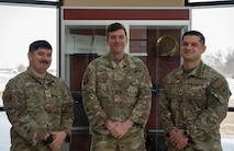 U.S. Air Force Tech. Sgt. Brandon Trinidad, 91st Security Forces Group chief of weapons and tactics (left), U.S. Air Force Master Sgt. Chad, 20th Air Force chief of weapons and tactics for ICBM security forces operations (middle) and U.S. Air Force Tech. Sgt. Aaron Bedker, 91st Missile Security Operations Squadron NCOIC weapons and tactics pose for a photo during a Nuclear Security Operations Tactics, Techniques and Procedures rewrite at Minot Air Force Base, North Dakota, Feb. 25, 2026. The rewrite establishes standardized procedures that ensure consistency, interoperability and mission assurance across the enterprise. (U.S. Air Force photo by Airman 1st Class Wesley Davies)