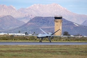 A U.S. Air National Guard MQ-9 Reaper unmanned aircraft system with the 214th Attack Group, taxia down a runway prior to takeoff at Davis-Monthan Air Force Base, Ariz., Mar. 10, 2026. The 214th has flown more than 5,000 sorties and provided more than 93,000 flying hours of combat mission support of contingency operations, providing overhead full-motion video to U.S. intelligence agencies and close air support to troops in contact. (U.S. Air National Guard photo by Tech. Sgt. Stephen Luke)