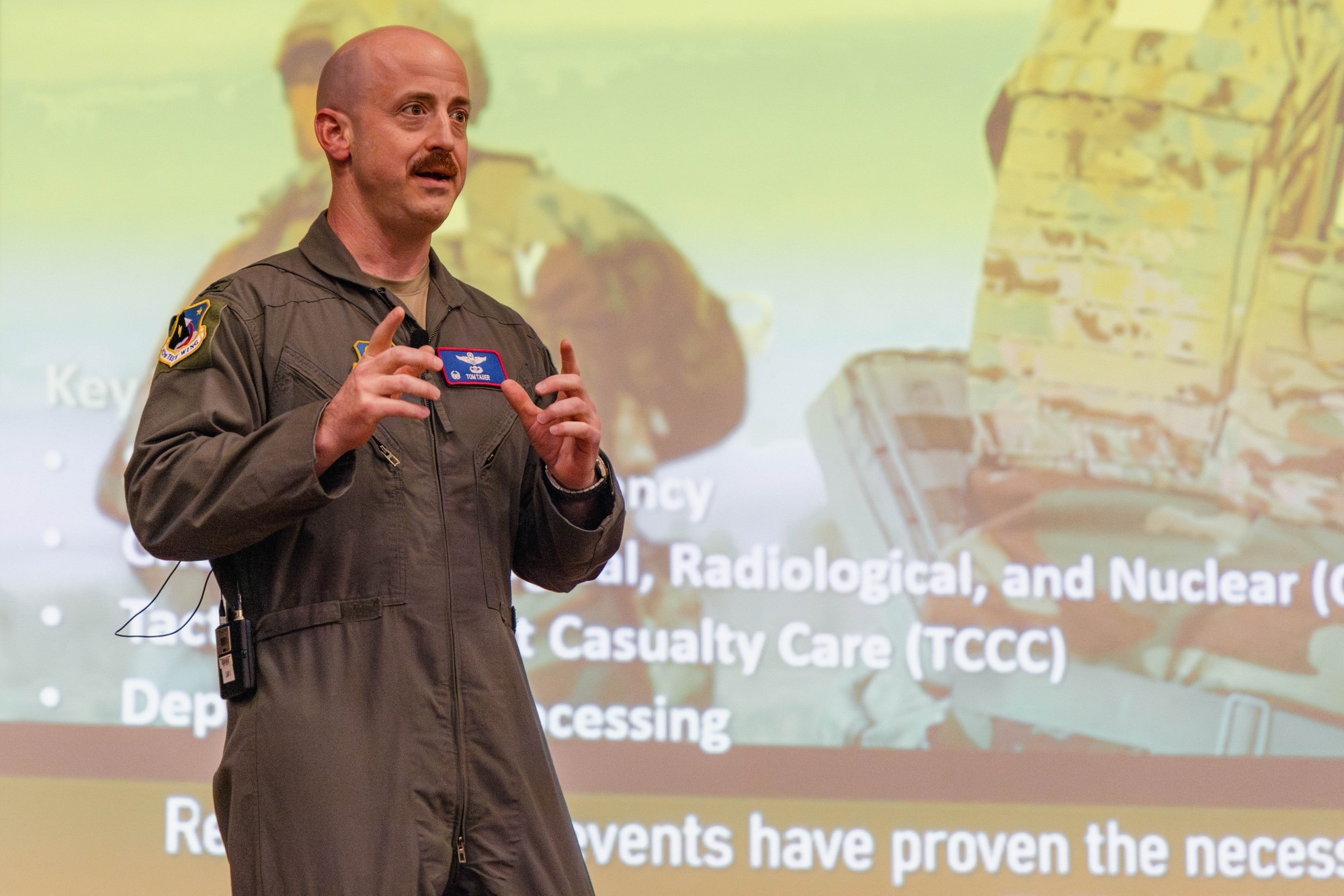 Col. Tom Tauer, 412th Test Wing commander, talks combat readiness, mission urgency, childcare, housing and other topics during the 412th TW commanders call March 11. (Photo by Brandon Hernandez)