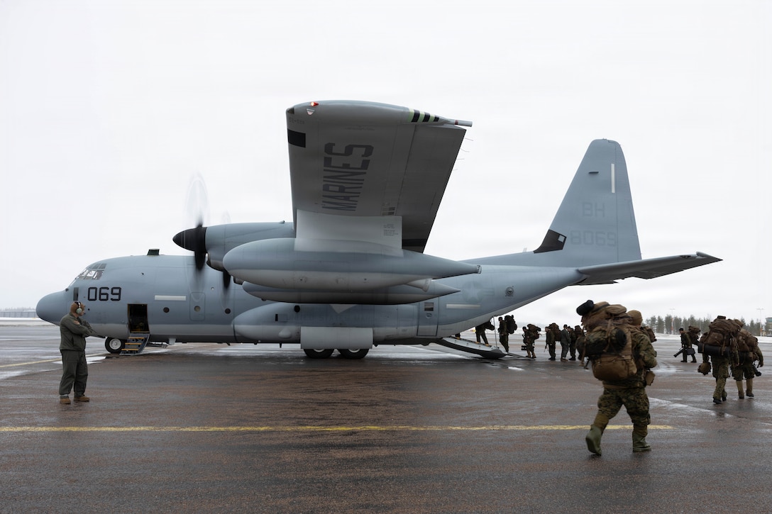 U.S. Marines with 2nd Battalion, 6th Marine Regiment, 2nd Marine Division, board a KC-130J Super Hercules aircraft with Marine Aerial Refueler Transport Squadron (VMGR) 252, Marine Aircraft Group 14, 2nd Marine Aircraft Wing, at Rovaniemi Air Base, Finland, March 18, 2026. VMGR-252 transported Marines to train their rapid deployment capabilities during exercise Cold Response 26. A key component of NATO's enhanced vigilance activity Arctic Sentry, exercise Cold Response 26 is a Norwegian-led winter military exercise designed to enhance collective defense capabilities and ensure U.S. readiness to rapidly deploy and seamlessly operate alongside NATO Allies in challenging arctic conditions. (U.S. Marine Corps photo by Cpl. Mya Seymour)